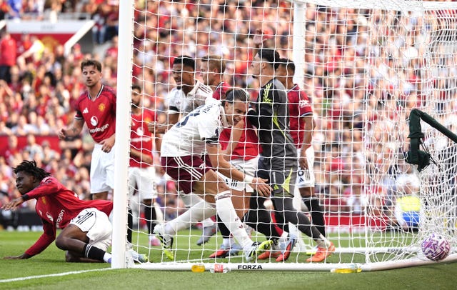Arsenal’s Riccardo Calafiori (centre) celebrates scoring
