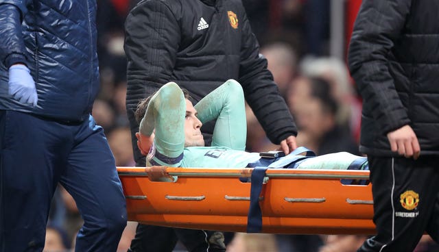 Rob Holding was taken off on a stretcher in Arsenal's draw at Manchester United on Wednesday