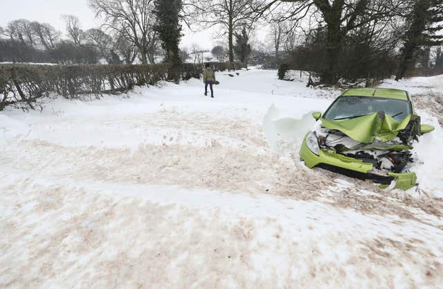 An abandoned car at Belah bridge in Cumbria (Owen Humphreys/PA)