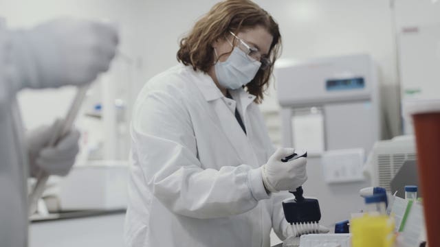 A scientist working on the Moderna coronavirus vaccine,