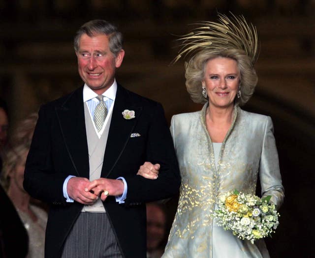The Prince of Wales and his bride the Duchess of Cornwall leave St George's Chapel in Windsor after their blessing (PA)