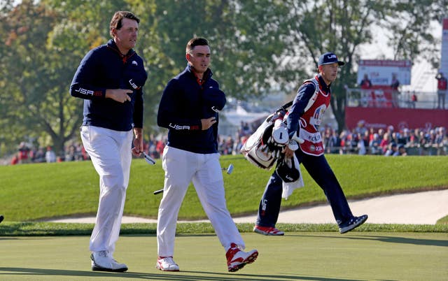 Mickelson (left) has developed a partnership with Rickie Fowler