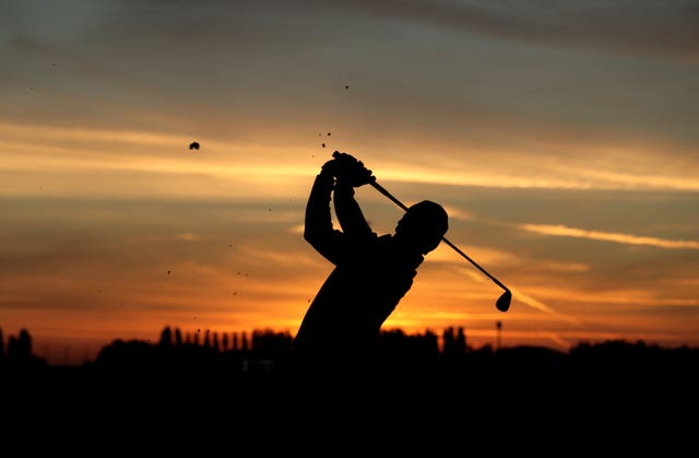 Rory McIlroy on the practice range before Saturday's opening fourballs