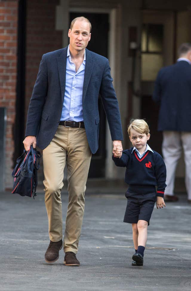 Prince George and his father the Duke of Cambridge on his first day at school at Thomas's Battersea (Richard Pohle/The Times/PA)