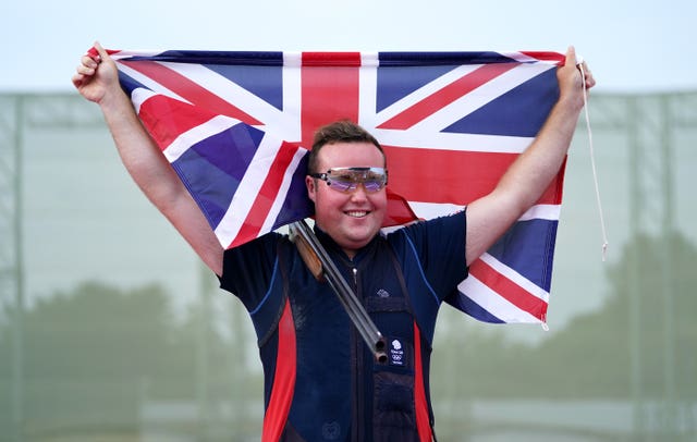 Matt Coward-Holley celebrates his bronze medal win