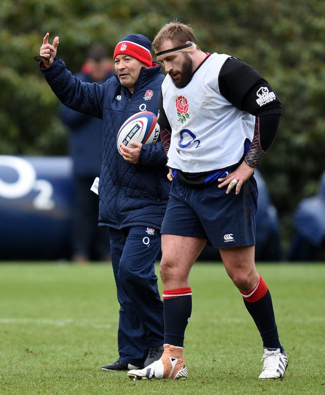 Eddie Jones (left) approves of the form shown by Joe Marler (right) last season