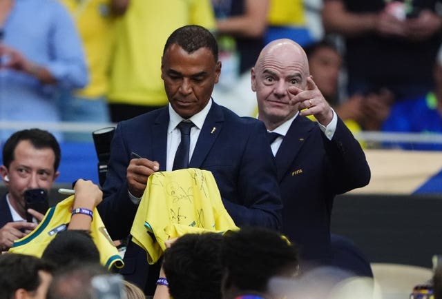 Cafu, left, pictured with FIFA president Gianni Infantino at the Scotland v Brazil World Cup match in Miami