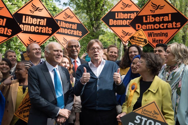 The European Parliament’s Brexit co-ordinator Guy Verhofstadt (centre), joins Lib Dem leader Sir Vince Cable (left) in London during their EU election campaign