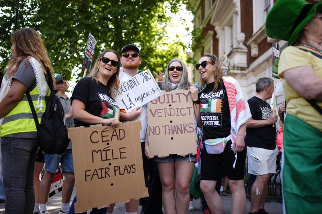 People with placards in support of Kneecap’s Liam Og O Hannaidh outside Westminster Magistrates’ Court