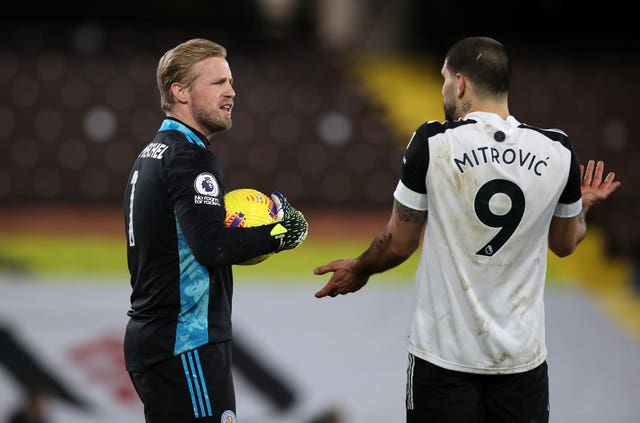 Kasper Schmeichel and Aleksandar Mitrovic have words