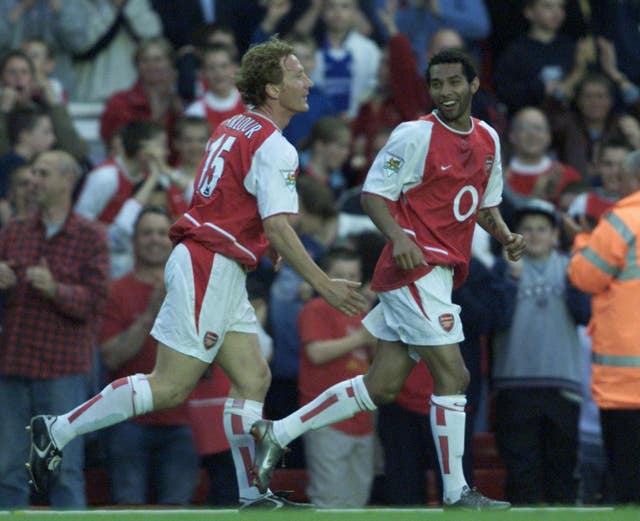 Arsenal's Jernaine Pennant, right, celebrates his hat-trick against Southampton with Ray Parlour