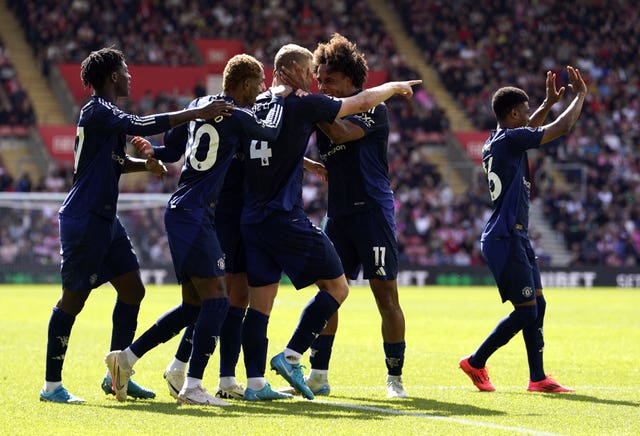 Manchester United players surround Matthijs de Ligt after he scored the opening goal against Southampton.