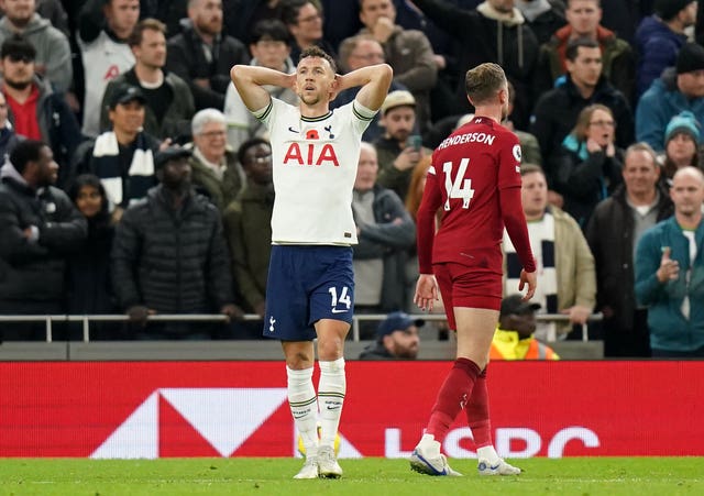 Liverpool withstand Tottenham rally to earn