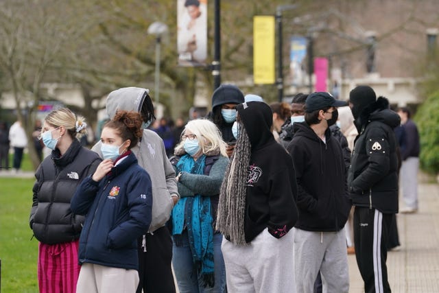 People queuing for antibiotics outside a building at the University of Kent in Canterbury