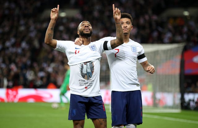 Sterling shows his t-shirt tribute following his side's third goal of the game (Nick Potts/PA)