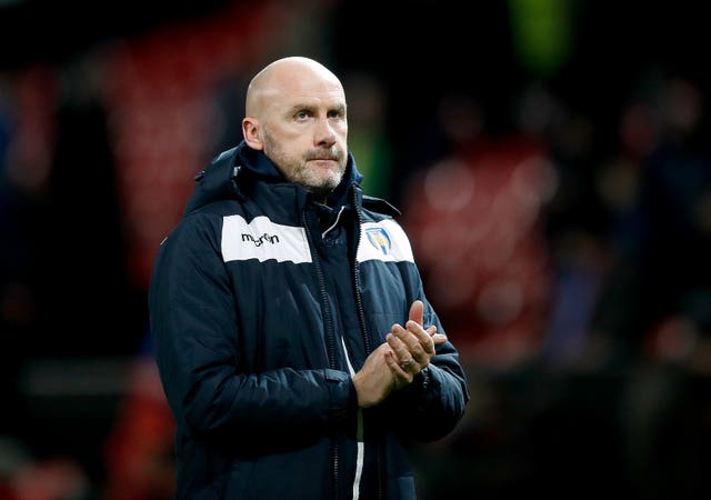 Colchester boss John McGreal was a proud man at Old Trafford