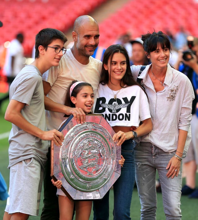 Guardiola says he enjoys time at home with his family (Mike Egerton/PA).