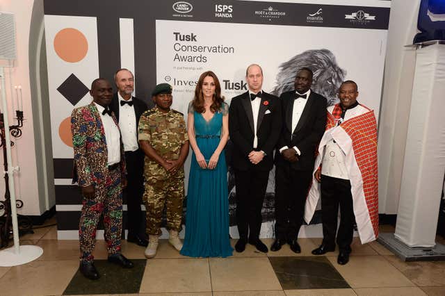 The Duke and Duchess of Cambridge stand for a photograph with guests at the Tusk Conservation Awards