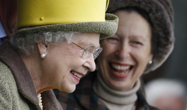 Head shots of the late Queen and Anne laughing together