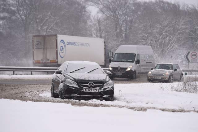 An abandoned car on the A1 near Peterborough (Joe Giddens/PA)