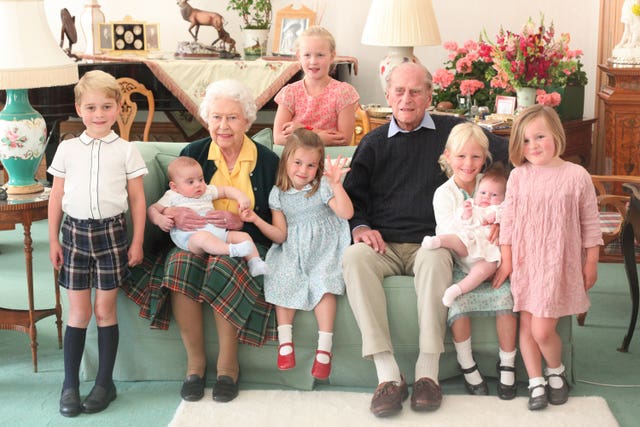 The Queen and Philip with seven of their great grandchildren - Prince George, Prince Louis, Savannah Phillips, Princess Charlotte, Isla Phillips holding Lena Tindall, and Mia Tindall