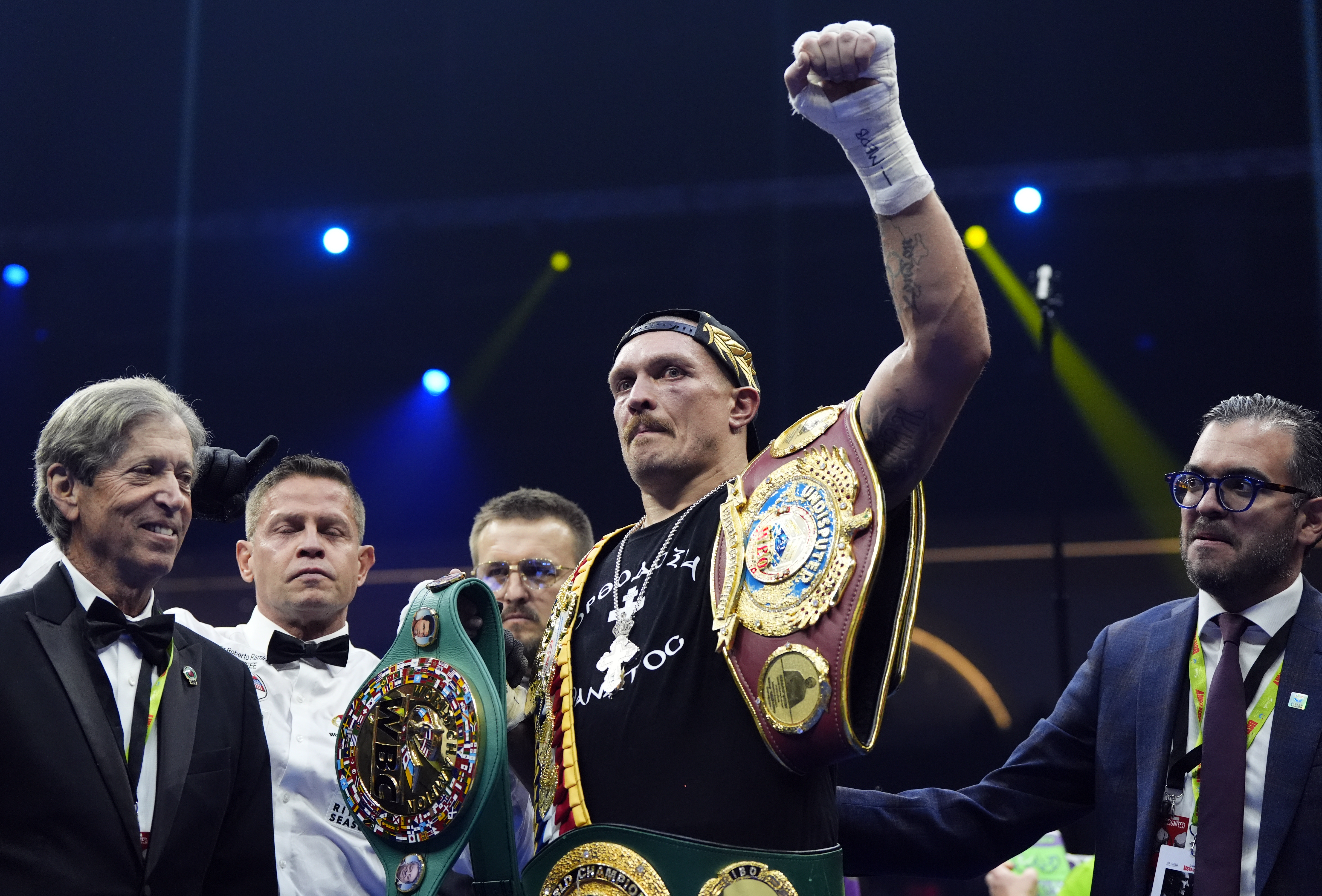 Oleksandr Usyk celebrates his win over Tyson Fury