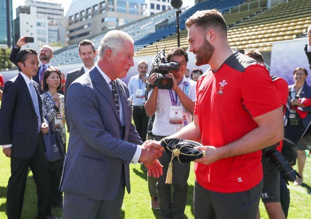 Prince Charles presented Owen Lane with his World Cup cap