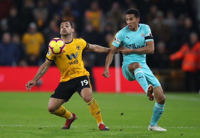 Isaac Hayden (right) opened the scoring for Newcastle