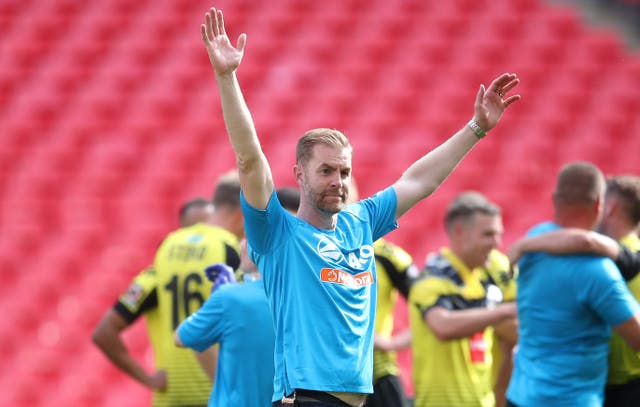 Simon Weaver celebrates his side's victory at Wembley after the final whistle