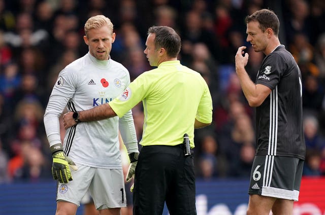 Kasper Schmeichel (left) had objects thrown in his direction