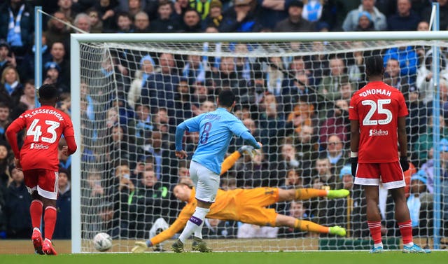 Ilkay Gundogan slots home the penalty