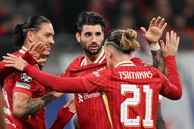 Darwin Núñez (left) celebrates with his teammates after scoring