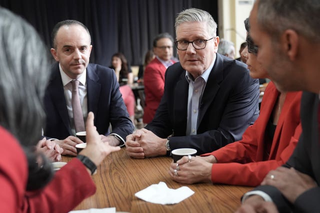 Prime Minister Sir Keir Starmer and James Murray, Chief Secretary to the Treasury (left), meet Labour Party members at Kingsdown Methodist Church Hall in Ealing, west London