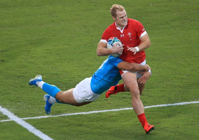 Wales overcame Uruguay to progress to the quarter-finals as pool winners 