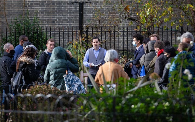 Pastor Regan King holds a service outside the church