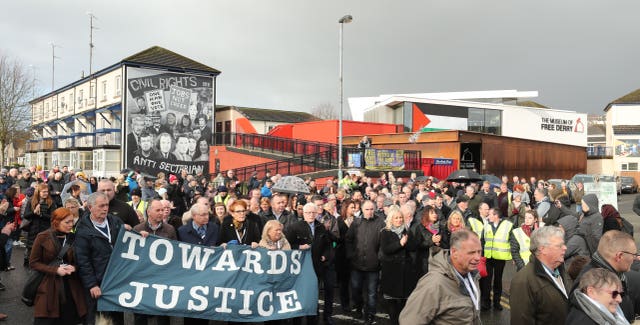 Families march through the Bogside in Londonderry