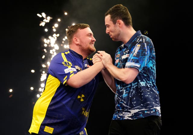 Luke Littler and Luke Humphries during their Premier League match