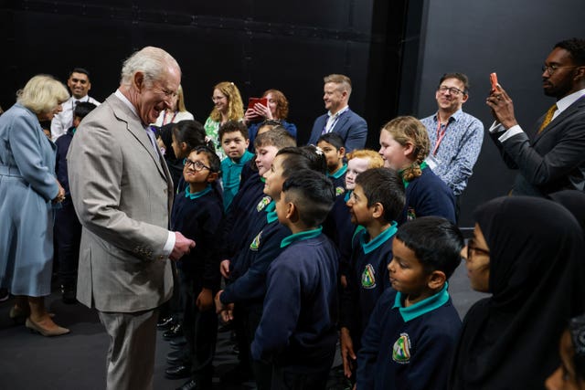 Charles and Camilla meeting school pupils
