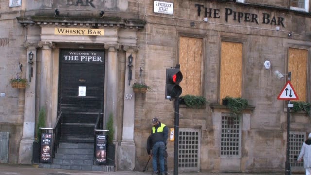 Boarded up pub