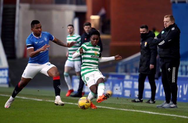 Alfredo Morelos, left, and Jeremie Frimpong battle for the ball