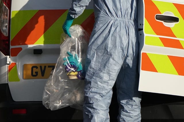 Forensic officers at the scene (Aaron Chown/PA)