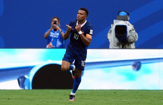 Kylian Mbappe celebrates
