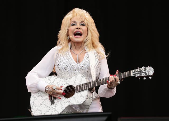 Dolly Parton performing on the Pyramid Stage at the Glastonbury Festival in 2014