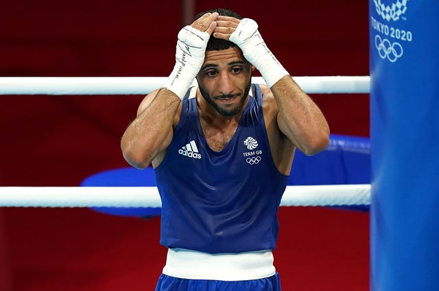 Galal Yafai celebrates winning gold against the Philippines' Carlo Paalam