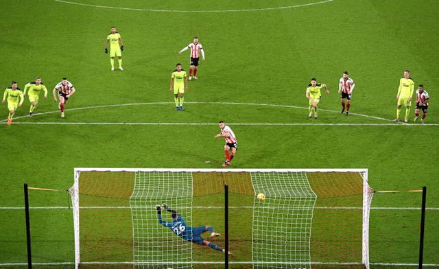 Billy Sharp scores the winning penalty