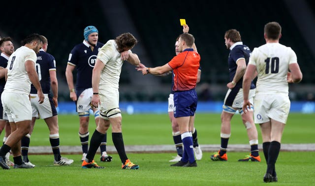 Billy Vunipola, left, is shown a yellow card by referee Andrew Brace