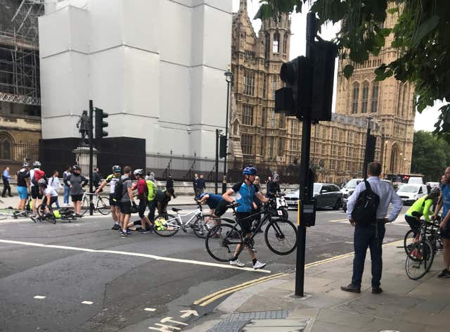 Cyclists in the aftermath of the crash