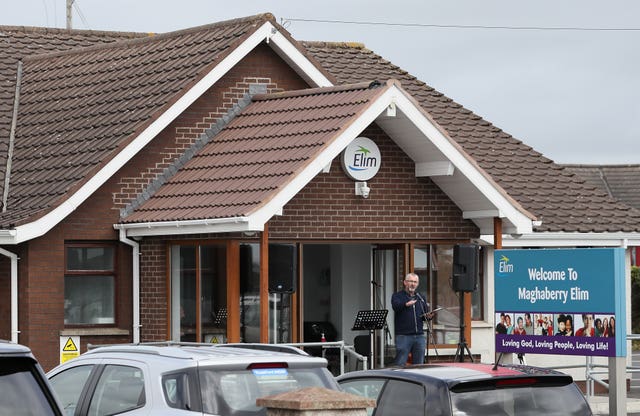 A pastor preaches during a drive-in service at Maghaberry Elim Pentecostal Church in Craigavon in Northern Ireland