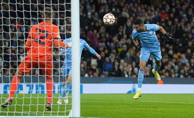 Riyad Mahrez scores a header for City