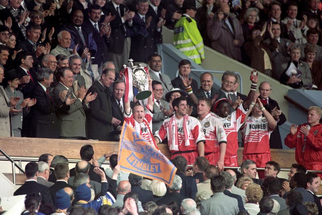 Shaun Edwards, lifting the trophy, went on to win the Challenge Cup a record nine times